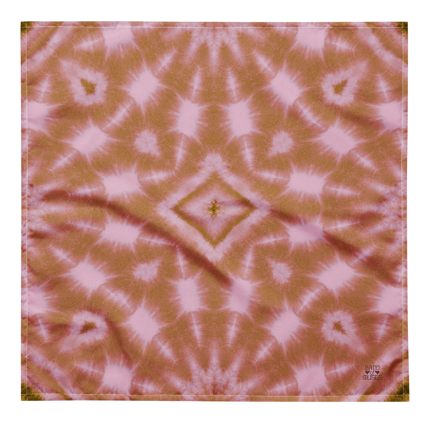 Band of Muses Cinnamon Bandana, featuring a tie-dye patterned fabric with pink and a maroon Band of Muses logo in the corner