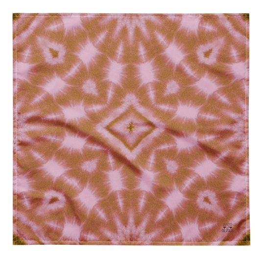 Band of Muses Cinnamon Bandana, featuring a tie-dye patterned fabric with pink and a maroon Band of Muses logo in the corner